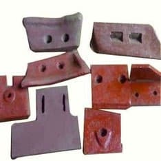 Mixer wear plates and liners